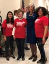 Congresswoman Clark stands with mothers from the gun reform group, Moms Demand Action.
