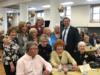 Congresswoman Clark poses with constituents at a Senior Center luncheon.