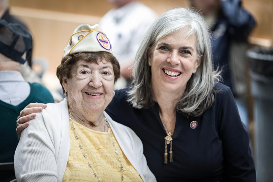 An image of Rep. Clark with a Gold Star wife. They are smiling together.